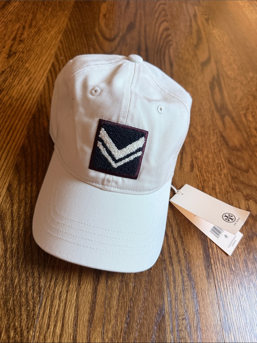 Tory Burch White Baseball Cap with Navy Chevron Patch